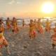 Bupati Buleleng I Nyoman Sutjidra memukul cengceng di main stage Pantai Lovina saat pembukaan Lovina Festival 2026.