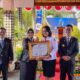Asisten Pemerintahan dan Kesra Setda Denpasar Komang Lestari Kusuma Dewi menerima penghargaan JDIH Nasional dan IRH 2026 di Kantor Wilayah Kementerian Hukum Bali.