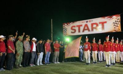 Bupati Buleleng dr. I Nyoman Sutjidra, Sp.OG. melepas peserta Lomba Gerak Jalan 45 Kilometer Tingkat Dewasa Putra di Lapangan Sepak Bola Desa Celukan Bawang.