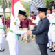 Wakil Walikota Denpasar I Kadek Agus Arya Wibawa mengukuhkan Paskibraka Kota Denpasar di halaman depan Gedung Dharma Negara Alaya.