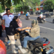 Pemkot Denpasar Bagikan Nasi Bungkus di SPBU
